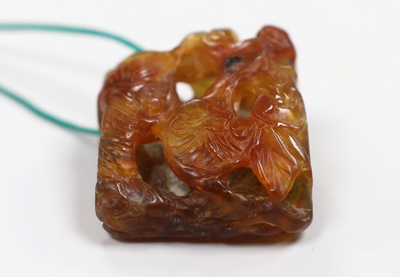 A Chinese chalcedony 'bats and lingzhi' carving , Qing dynasty, 3.5cm
